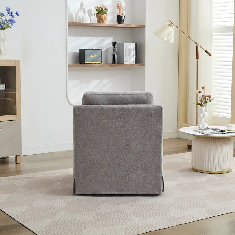 Fauteuil pivotant en chenille avec coussin de dossier amovible