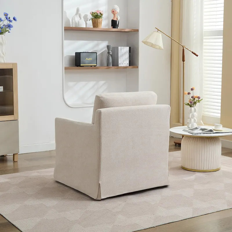 Fauteuil pivotant en chenille avec coussin de dossier amovible