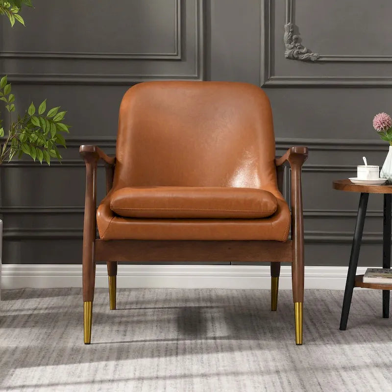 Fauteuil d'appoint en similicuir avec cadre en bois et pieds fuselés