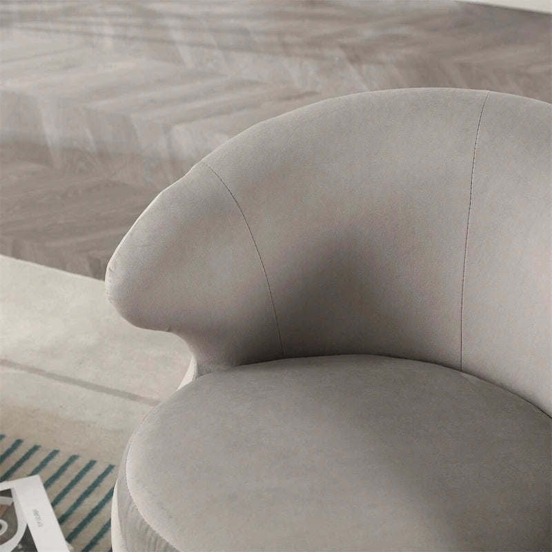 Fauteuil pivotant à 360° avec accoudoirs arrondis